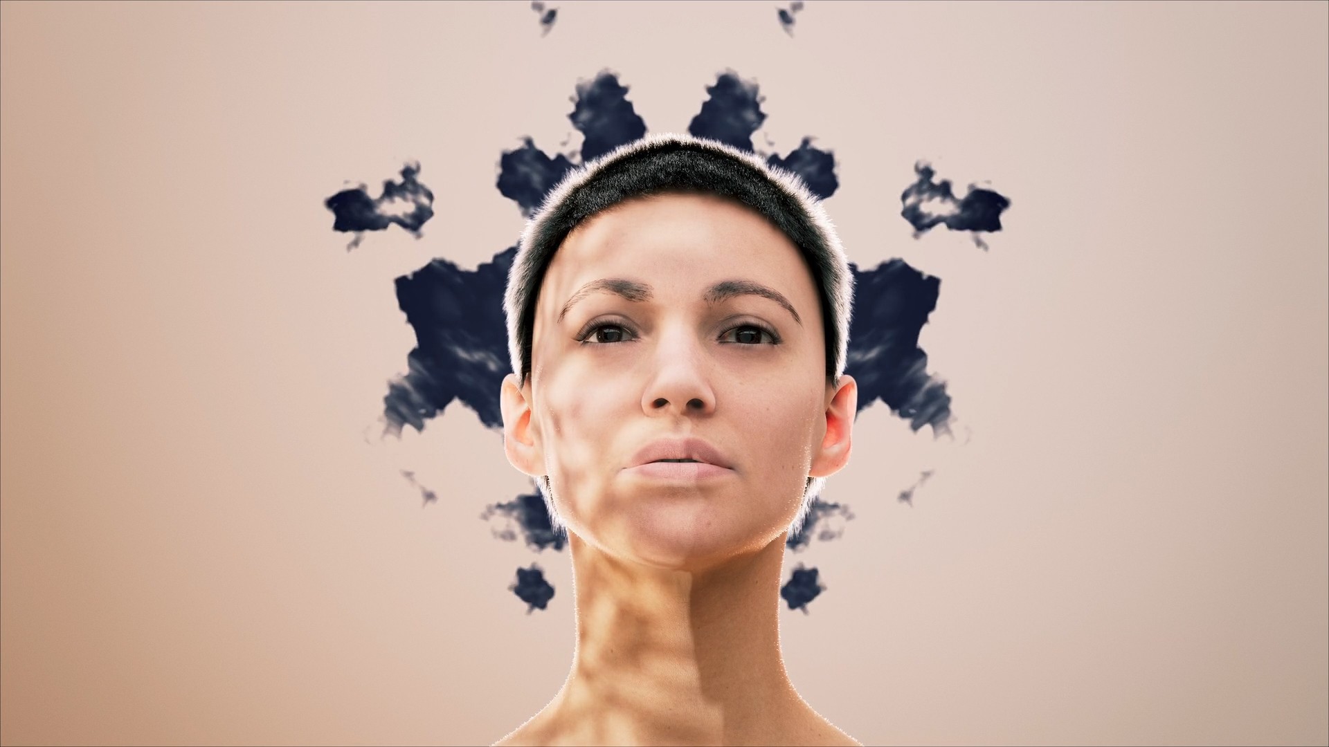 3D animation of Face with rorschach ink patterns in background to visualis schizophrenia.jpg